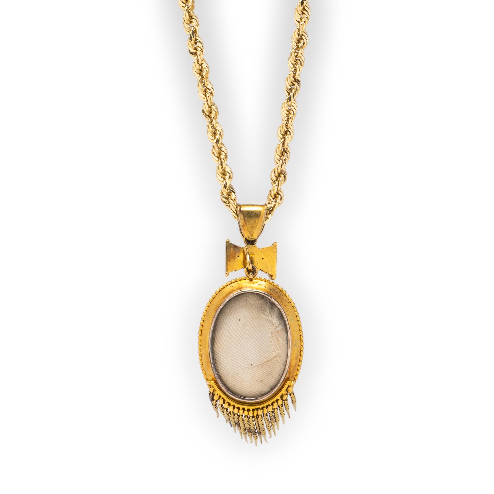 VICTORIAN, GOLD, GARNET, ENAMEL AND DIAMOND PENDANT ON LATER CHAIN