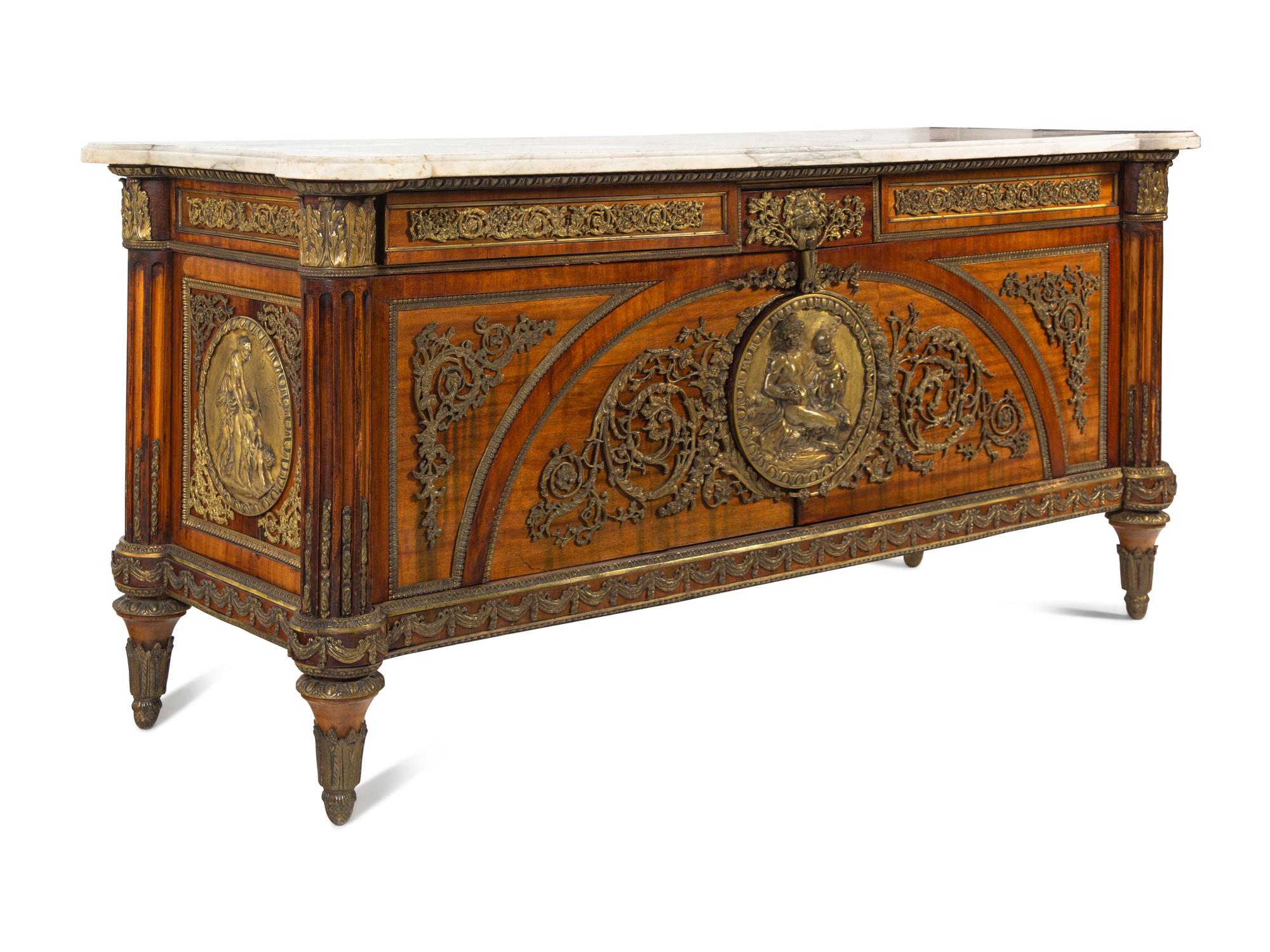 A Louis XVI Style Gilt Bronze Mounted Mahogany Marble-Top Commode à Vantaux