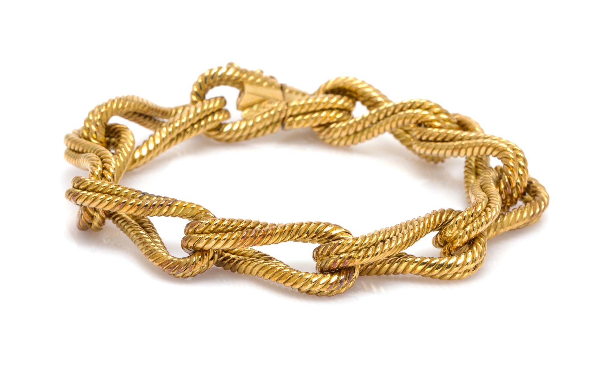 An 18 Karat Yellow Gold Textured Link Bracelet, 24.60 dwts.