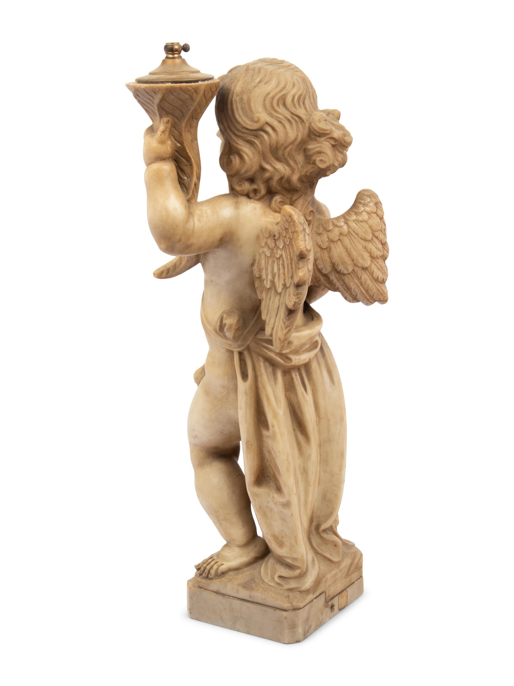 An Italian Composite Figure of a Putto with a Cornucopia