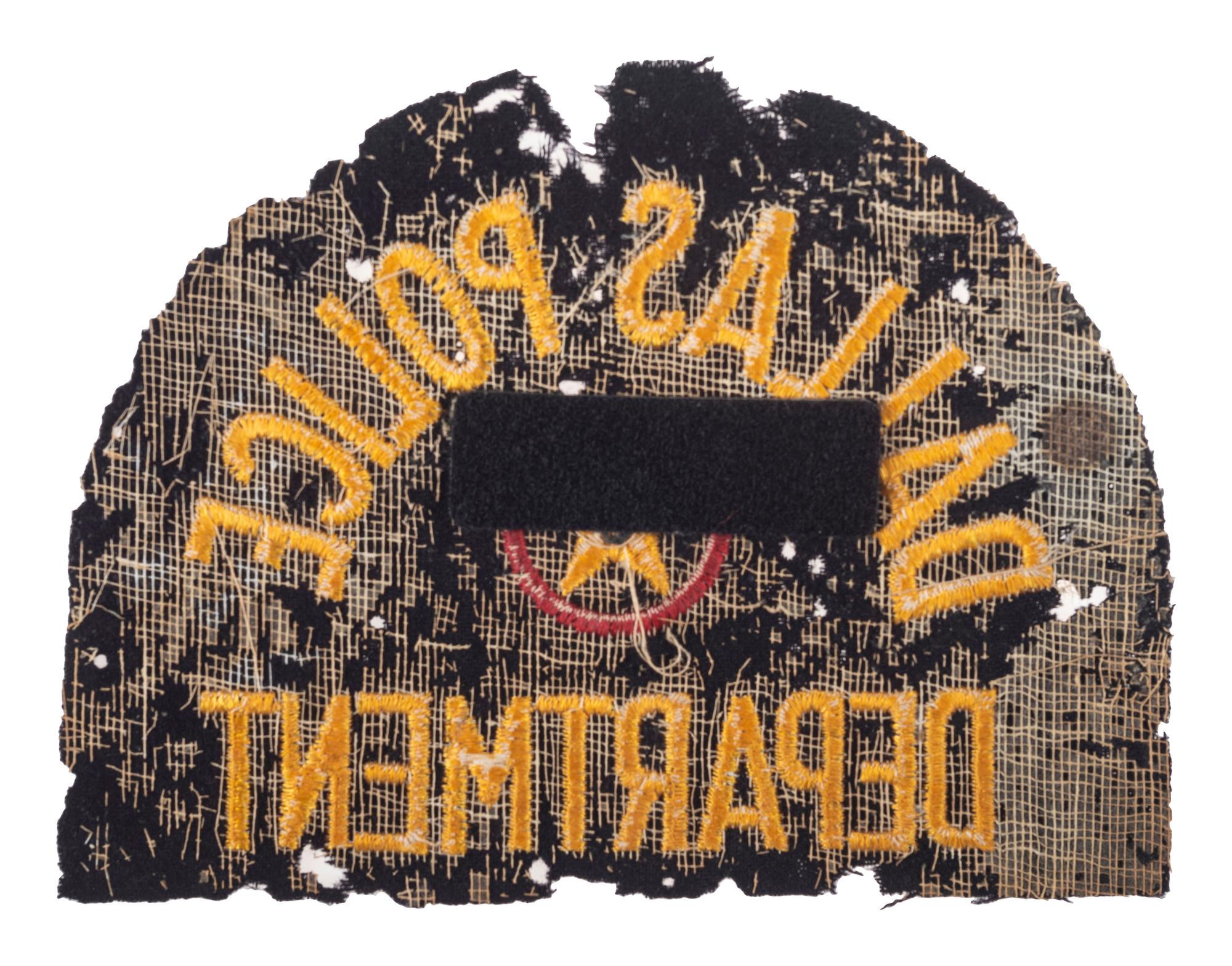 [POLITICS] -- [KENNEDY, John F. (1917-1963)]. Officer Bobby Hargis' Dallas Police shoulder patch worn during the Kennedy Assassination with inscribed photograph from Officer Hargis.