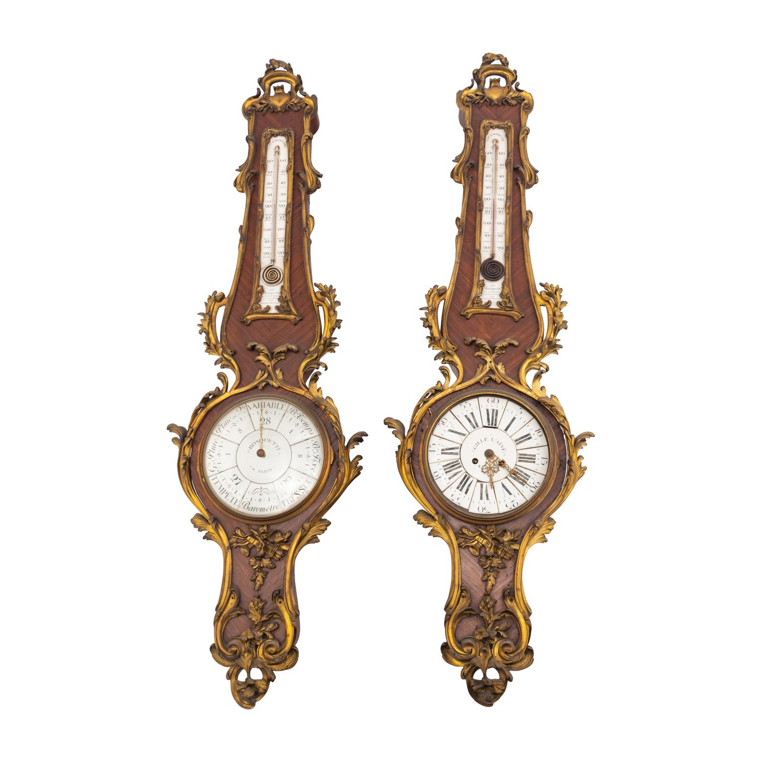 A Louis XV Style Gilt Bronze Mounted Kingwood Cartel Clock and Barometer