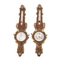 A Louis XV Style Gilt Bronze Mounted Kingwood Cartel Clock and Barometer