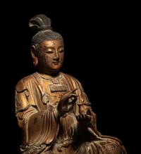 A Gilt Wood Figure of Seated Guanyin