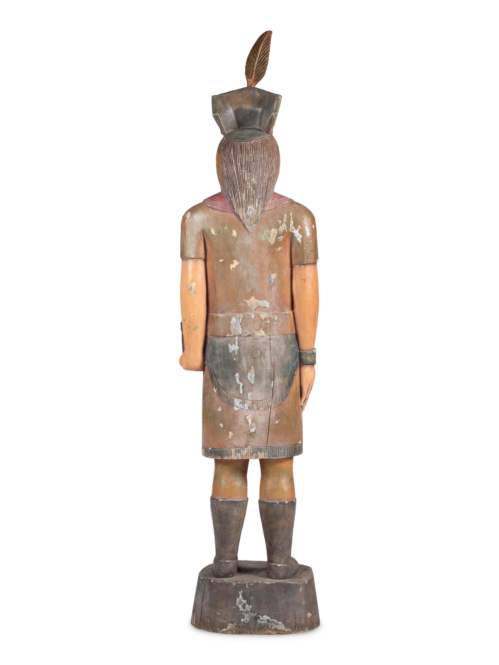 A Folk Art Carved and Painted Pine Native American Cigar Store Figure