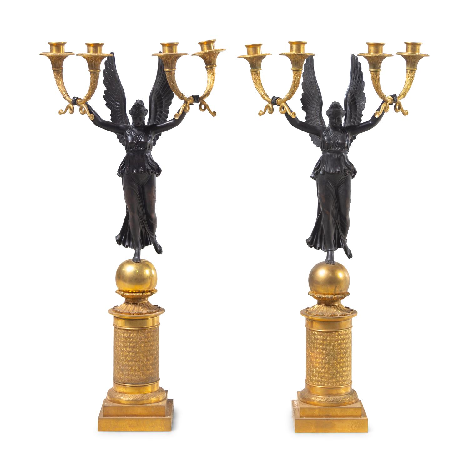 A Pair of Empire Style Gilt and Patinated Bronze Four-Light Candelabra