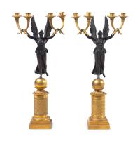 A Pair of Empire Style Gilt and Patinated Bronze Four-Light Candelabra