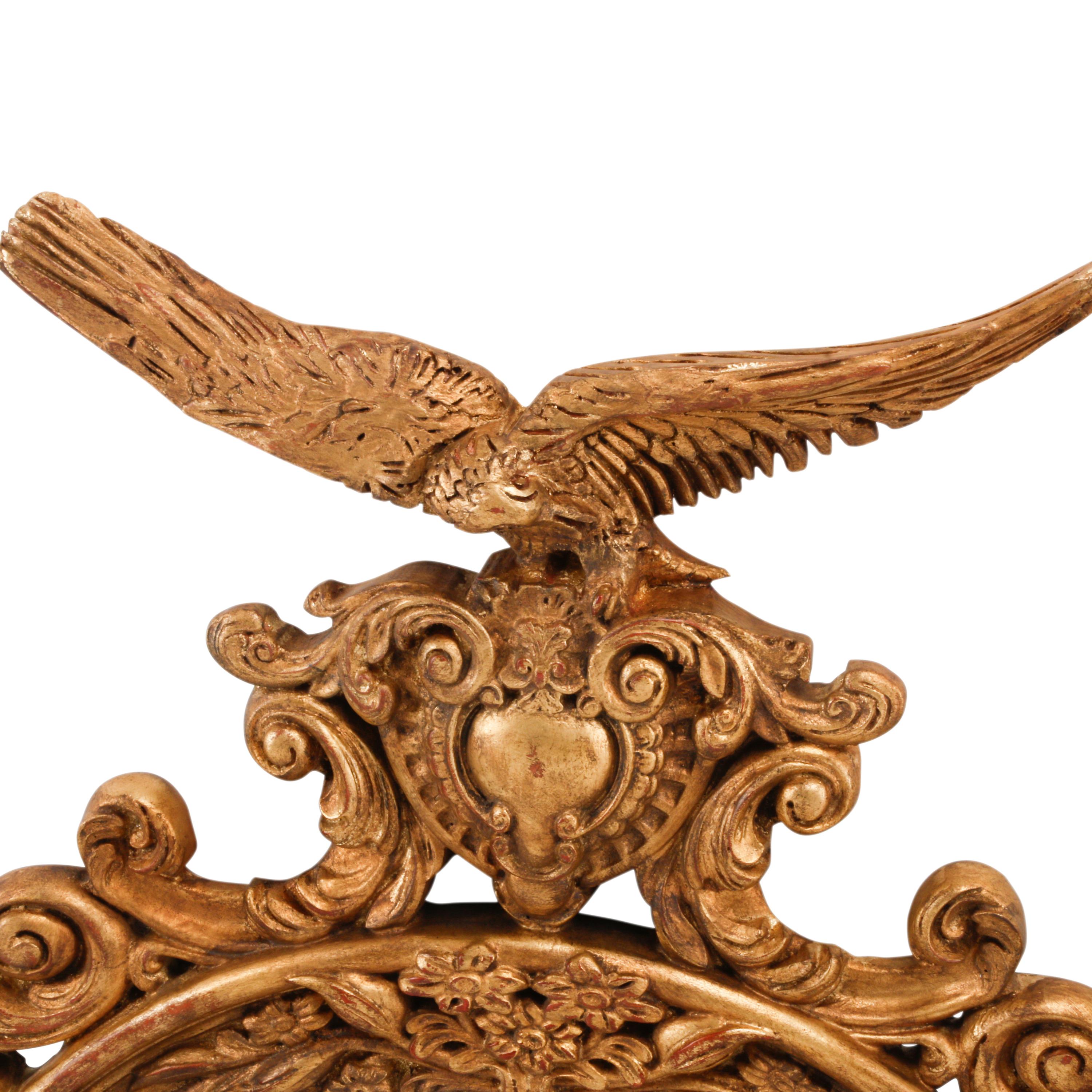 A Pair of Regency Style Giltwood Bullseye Mirrors