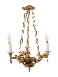 A Continental Gilt Metal Figural Three-Light Chandelier