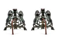 A Pair of Continental Cast Metal Andirons