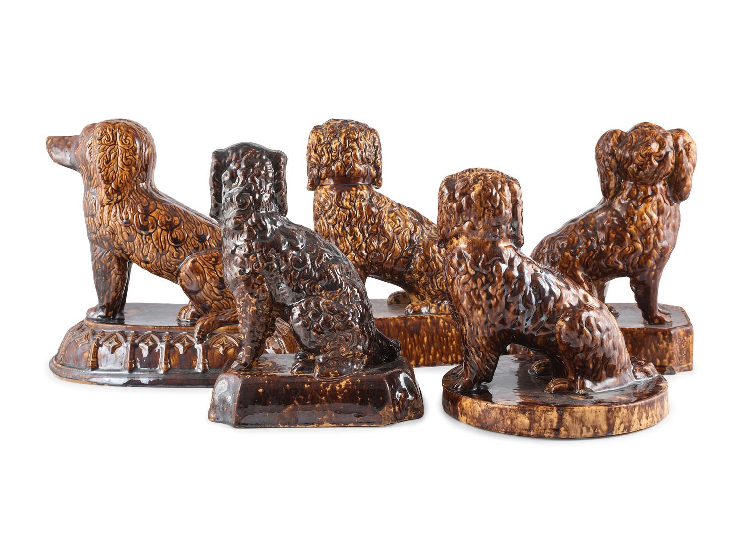 Five Rockingham Glaze Spaniel Figures