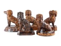 Five Rockingham Glaze Spaniel Figures