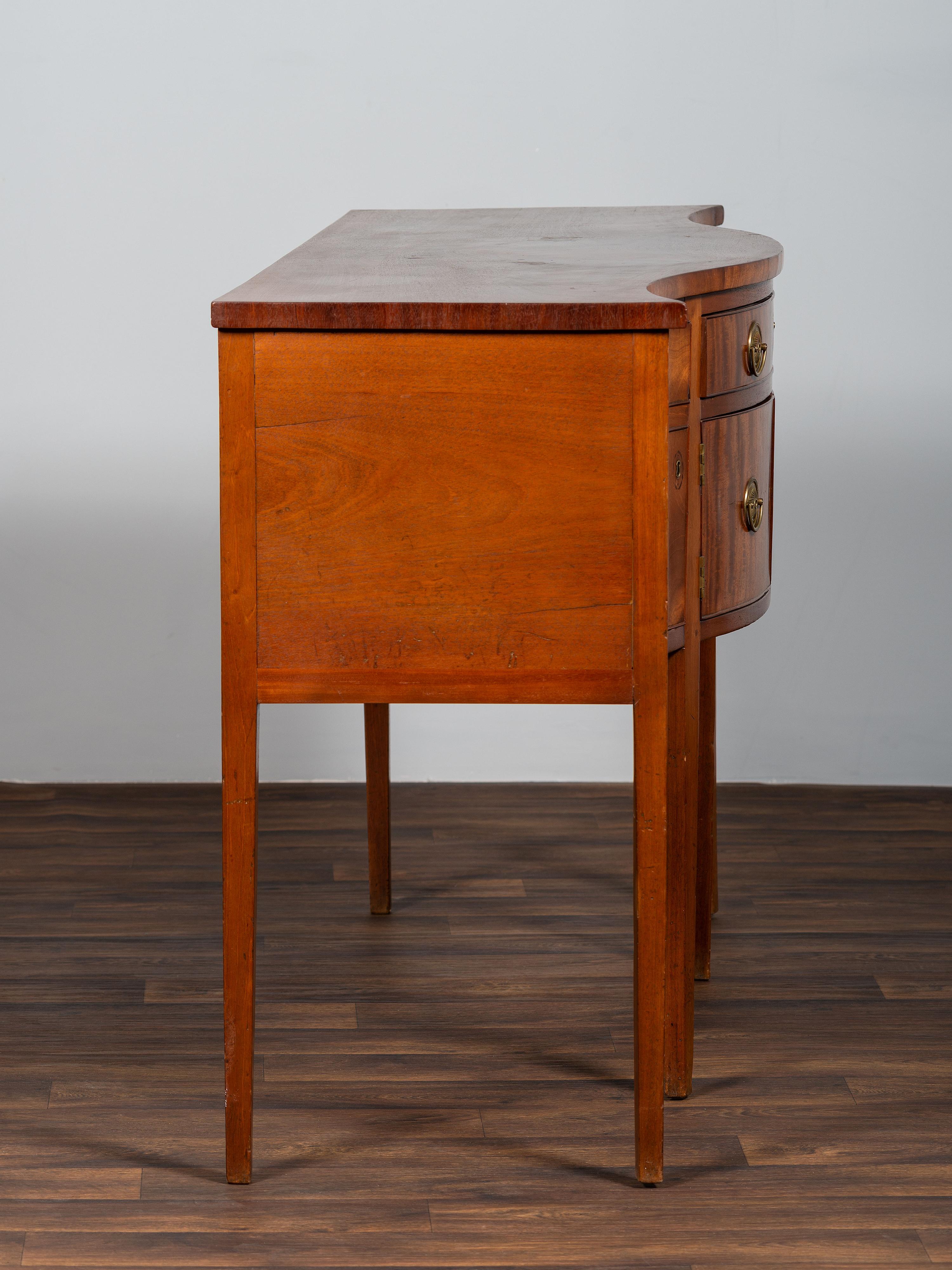 A Federal Figured Mahogany Serpentine Sideboard