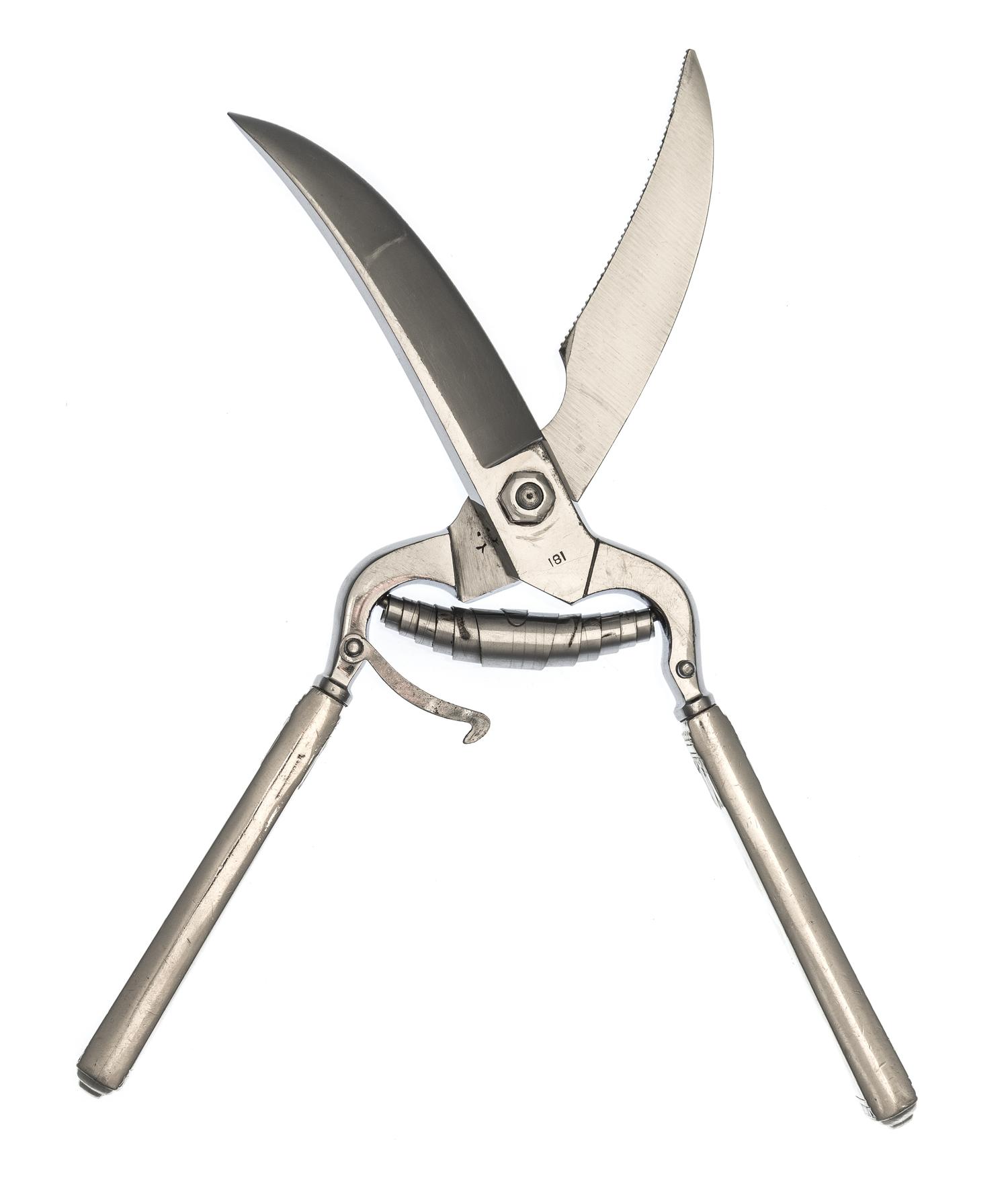 A Pair of American Silver Handled Poultry Shears, Cartier, New York, NY, 20th Century, the handles having foliate decoration and scallo