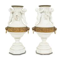 A Pair of Gilt Metal Mounted Bisque Porcelain Urns