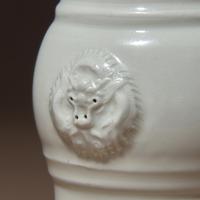 Two Chinese Blanc-de-Chine Porcelain Vases, 17th-18th Century — 清中期 德化白瓷雙輔首耳筒瓶及花觚
