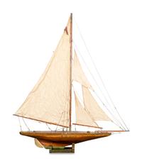 A Four-Sail Gaff-Rigged Pond Yacht on Stand