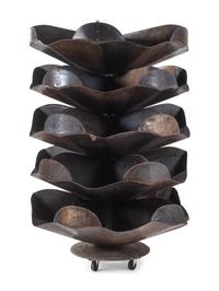 A Five Tier Sheet Metal Rotating Rack