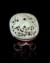 A Chinese Pale Celadon Jade Reticulated Belt Plaque
