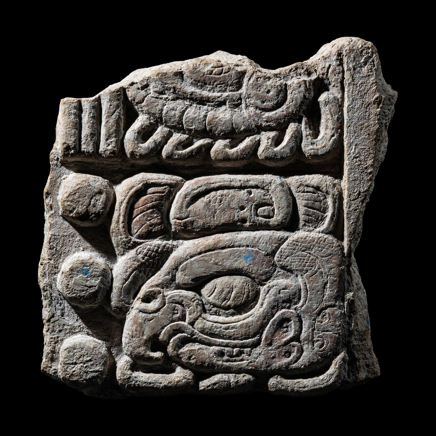 A Maya Limestone Fragment with Glyphs