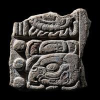 A Maya Limestone Fragment with Glyphs