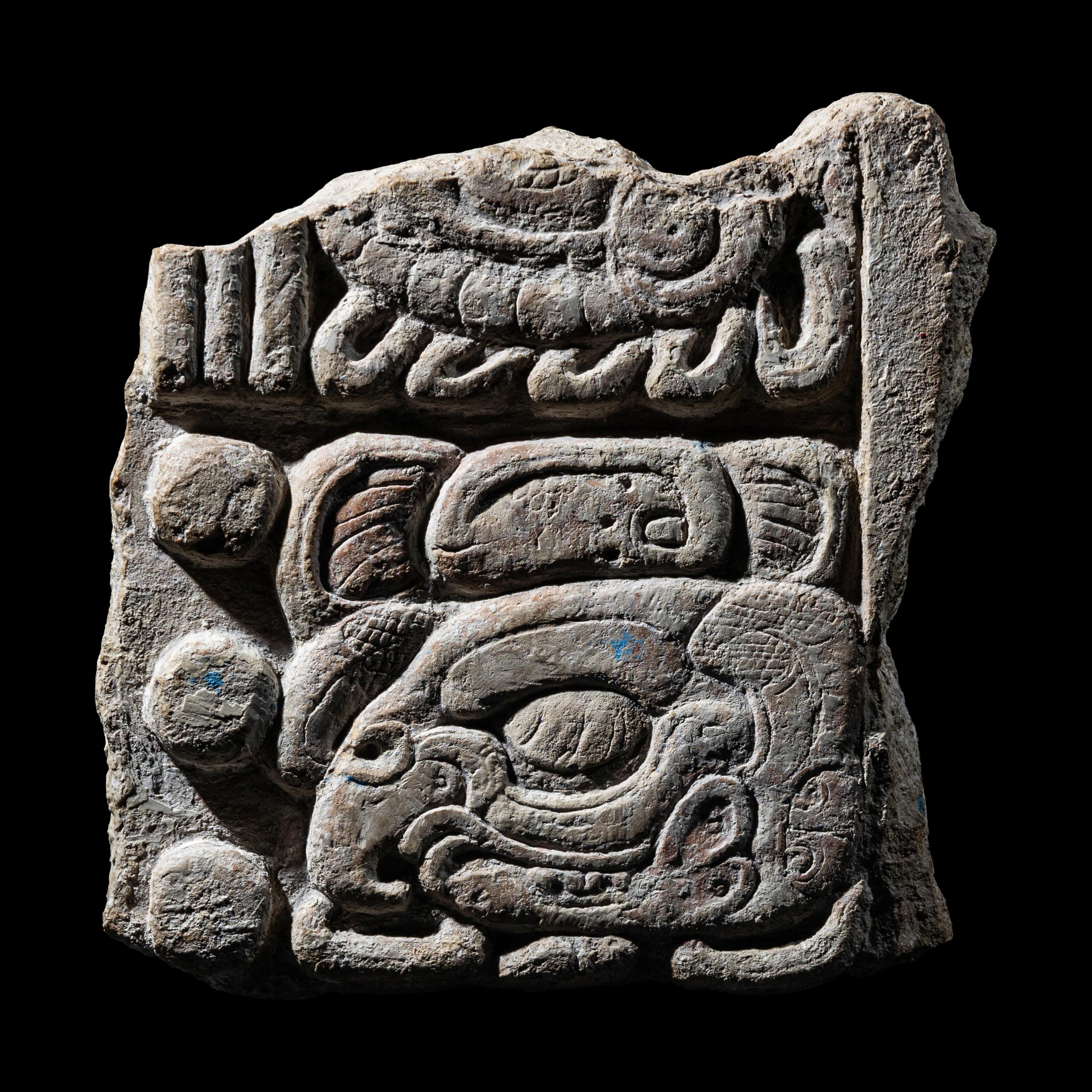 A Maya Limestone Fragment with Glyphs