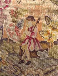 A William and Mary Style Carved Walnut Armchair with Needlepoint Upholstery