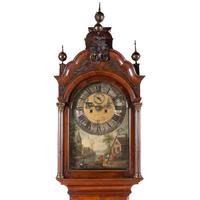 A Dutch Walnut and Gilt Metal Mounted Tall Case Clock