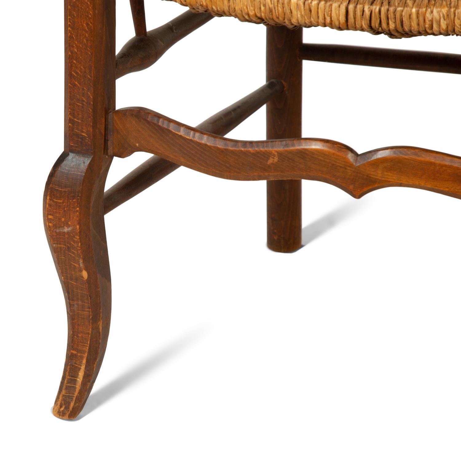 A Set of Four French Provincial Style Walnut Dining Chairs