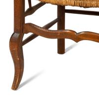A Set of Four French Provincial Style Walnut Dining Chairs