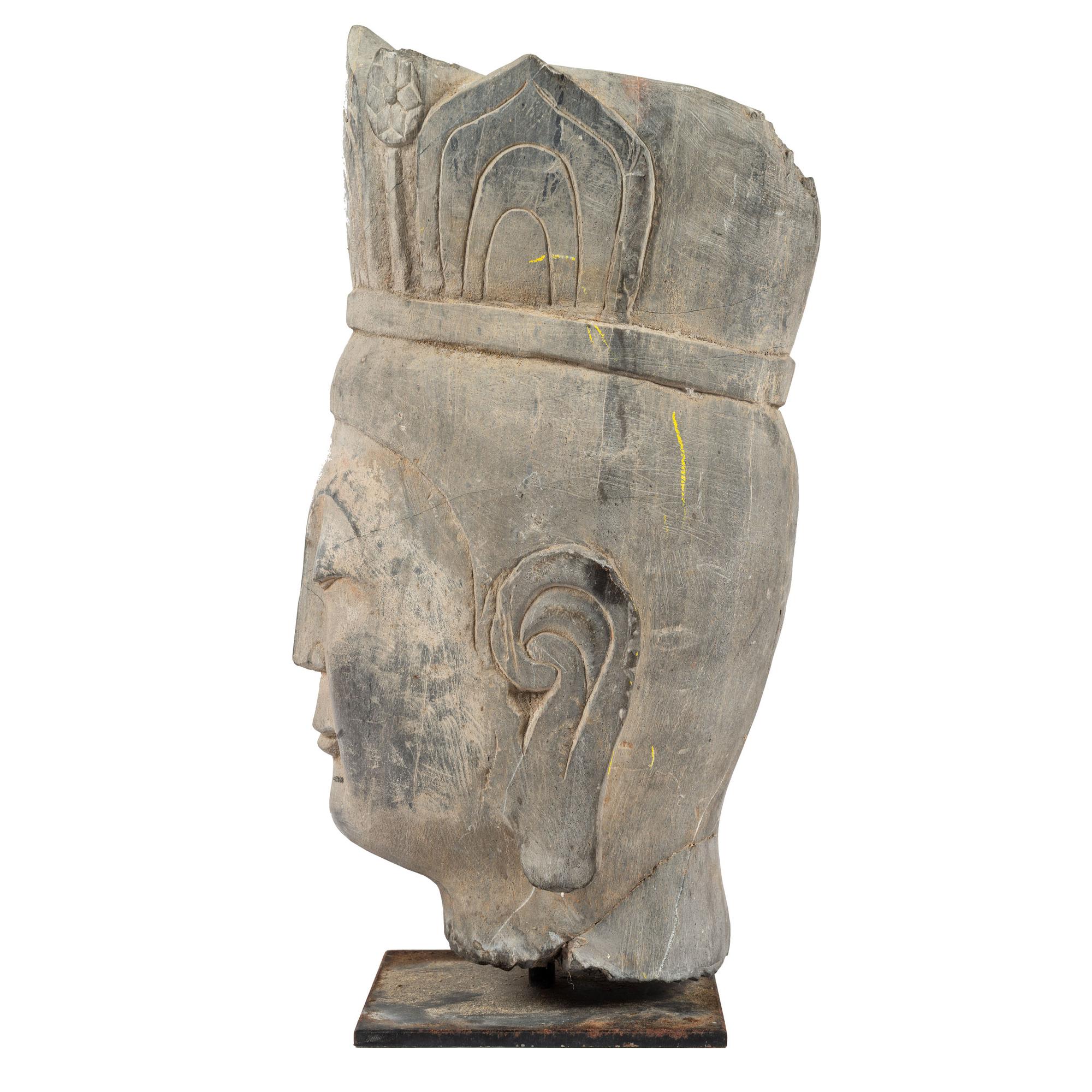 A Carved Stone Buddha Head