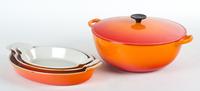 A Set of Four Le Creuset Cooking and Baking Utensils
