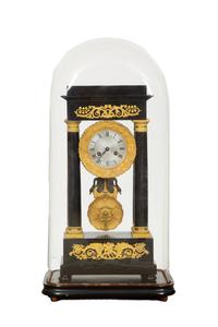 A Charles X Gilt Bronze Mounted Ebonized Portico Clock