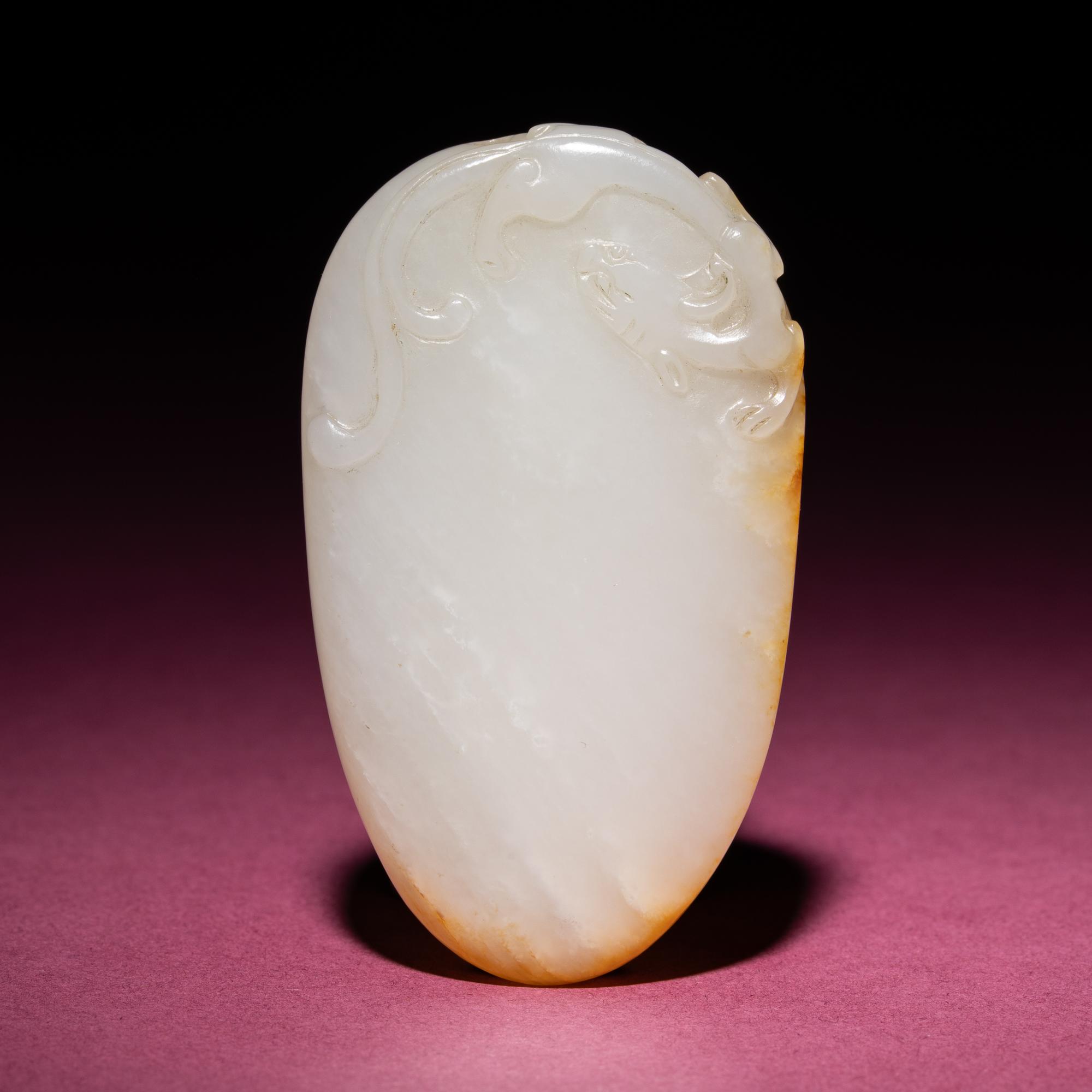 A Chinese Russet and White Jade 'Chilong' Pendant, 18th/19th Century — 清中期 白玉留皮螭龍紋佩