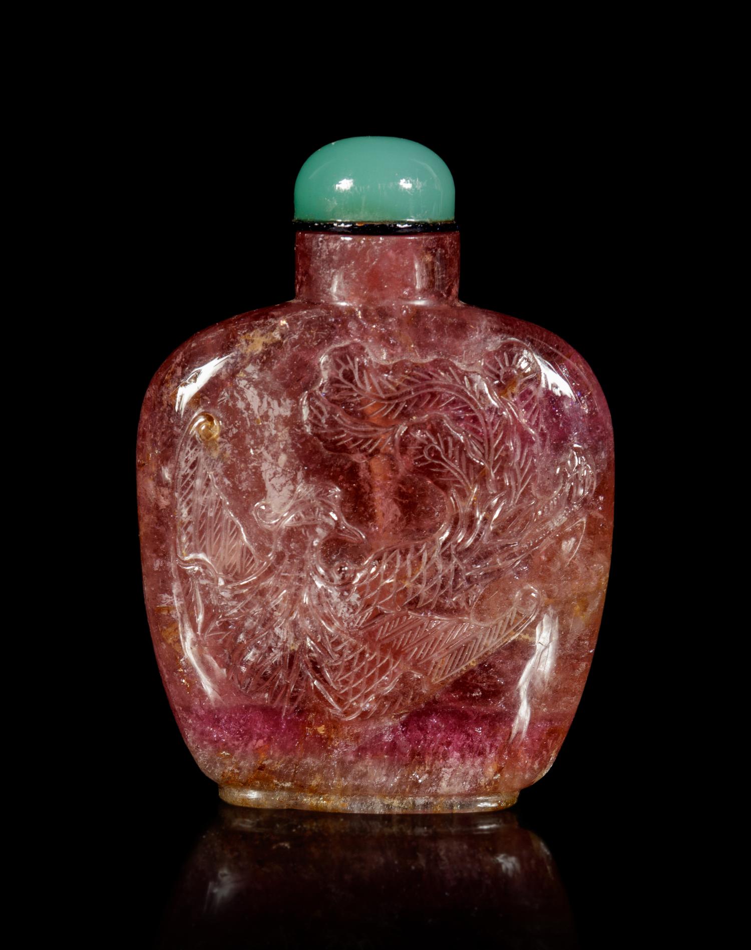 A Tourmaline 'Dragon and Phoenix' Snuff Bottle