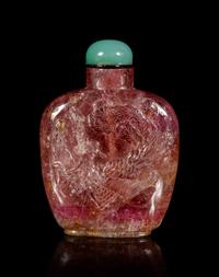 A Tourmaline 'Dragon and Phoenix' Snuff Bottle