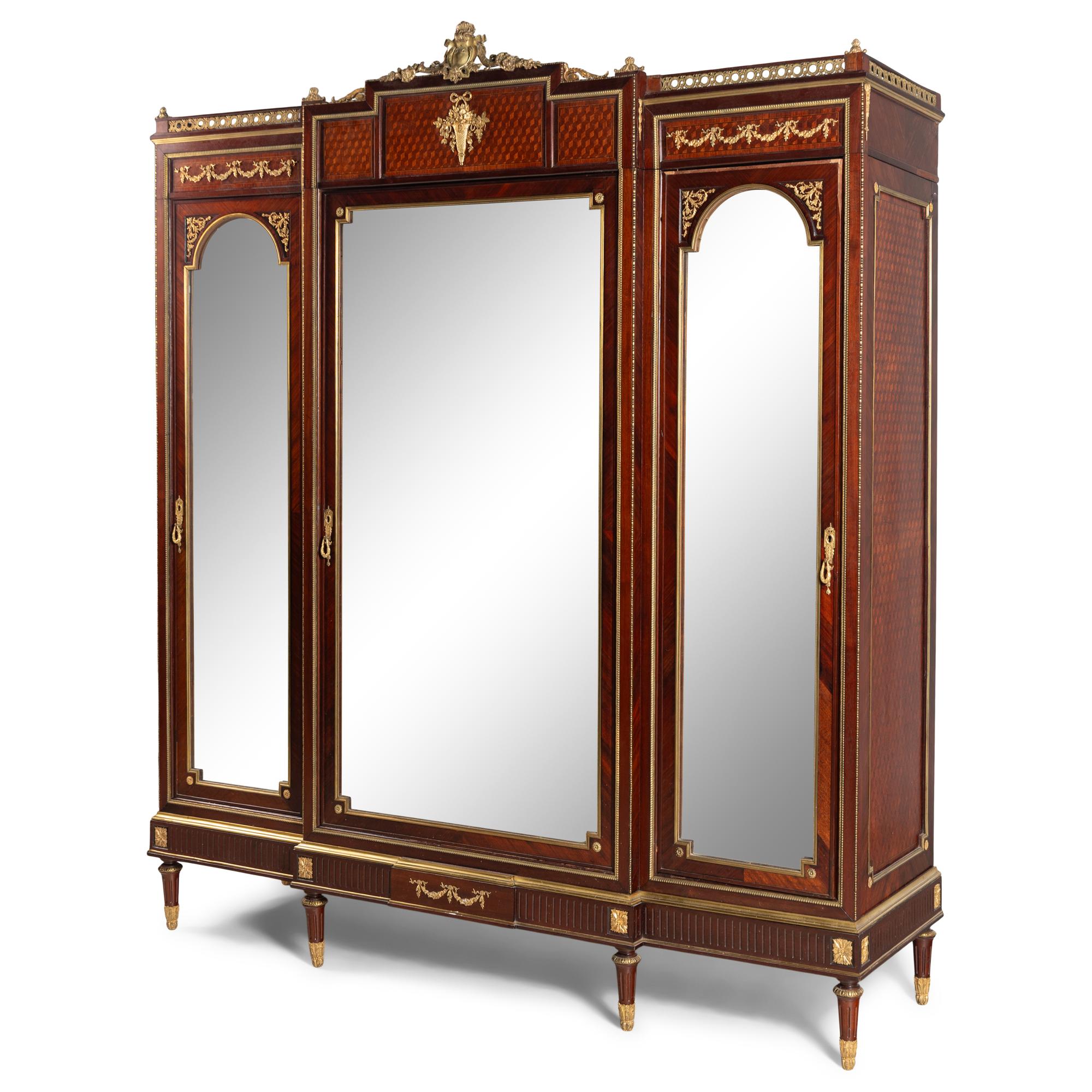A Louis XVI Style Mahogany, Parquetry and Gilt Bronze Mounted Dressing Cabinet