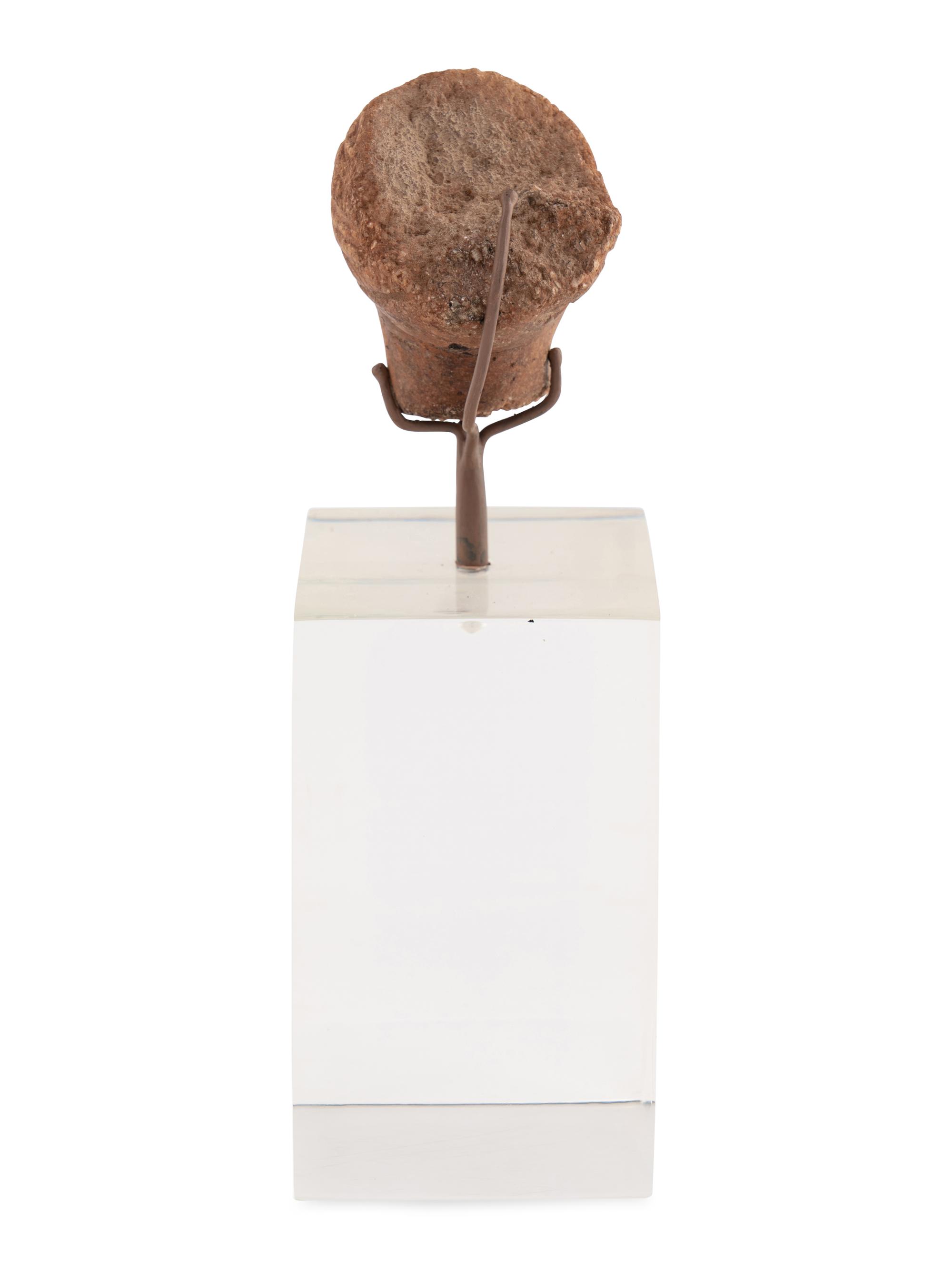 A Roman Stone Head of a Woman