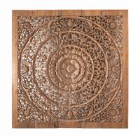 A Southeast Asian Carved Teakwood Mandala Panel