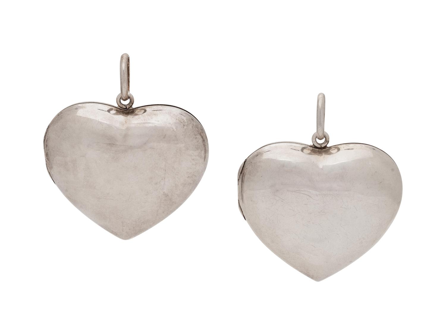 A Collection of Sterling Silver Heart Lockets,