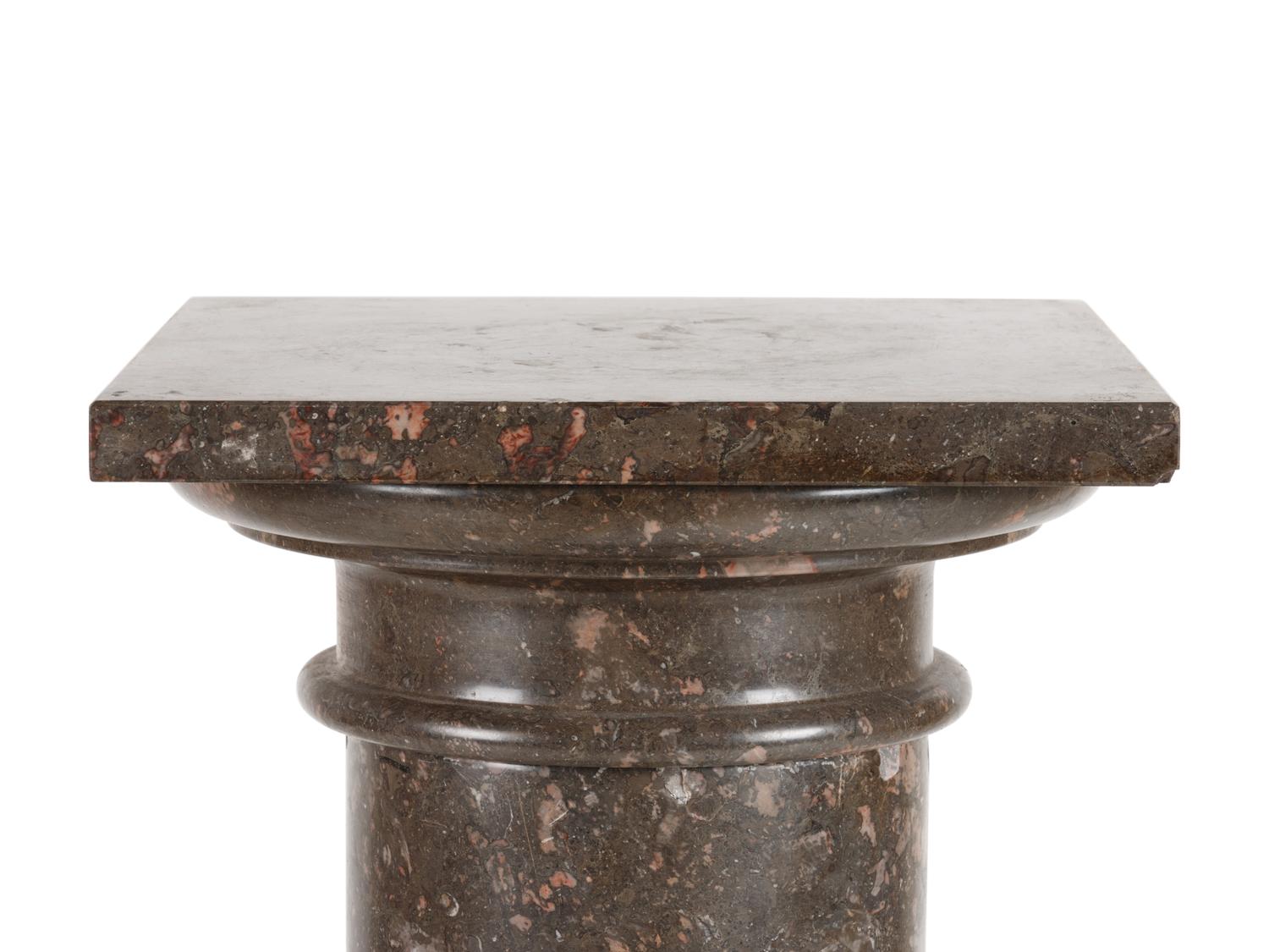 A Neoclassical Carved Marble Pedestal