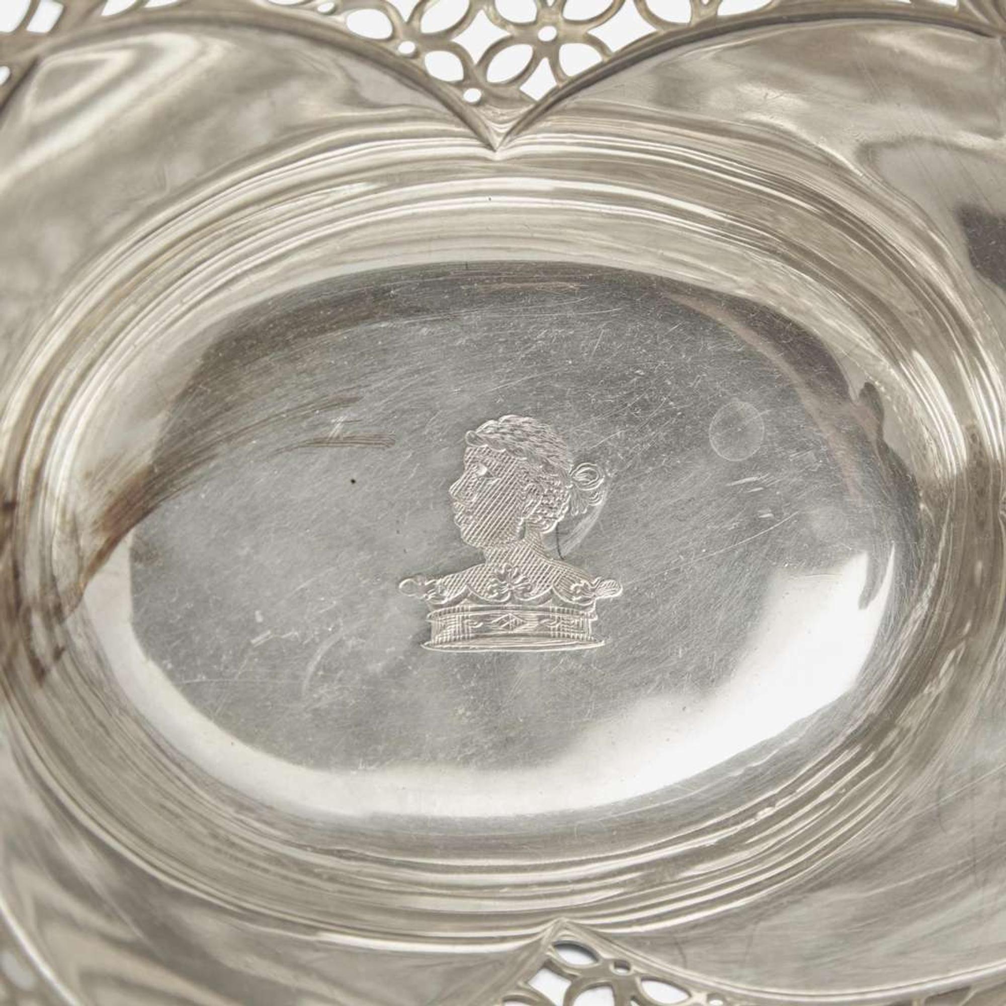 A George III sterling silver nine-basket epergne Thomas Pitts, London, 1768