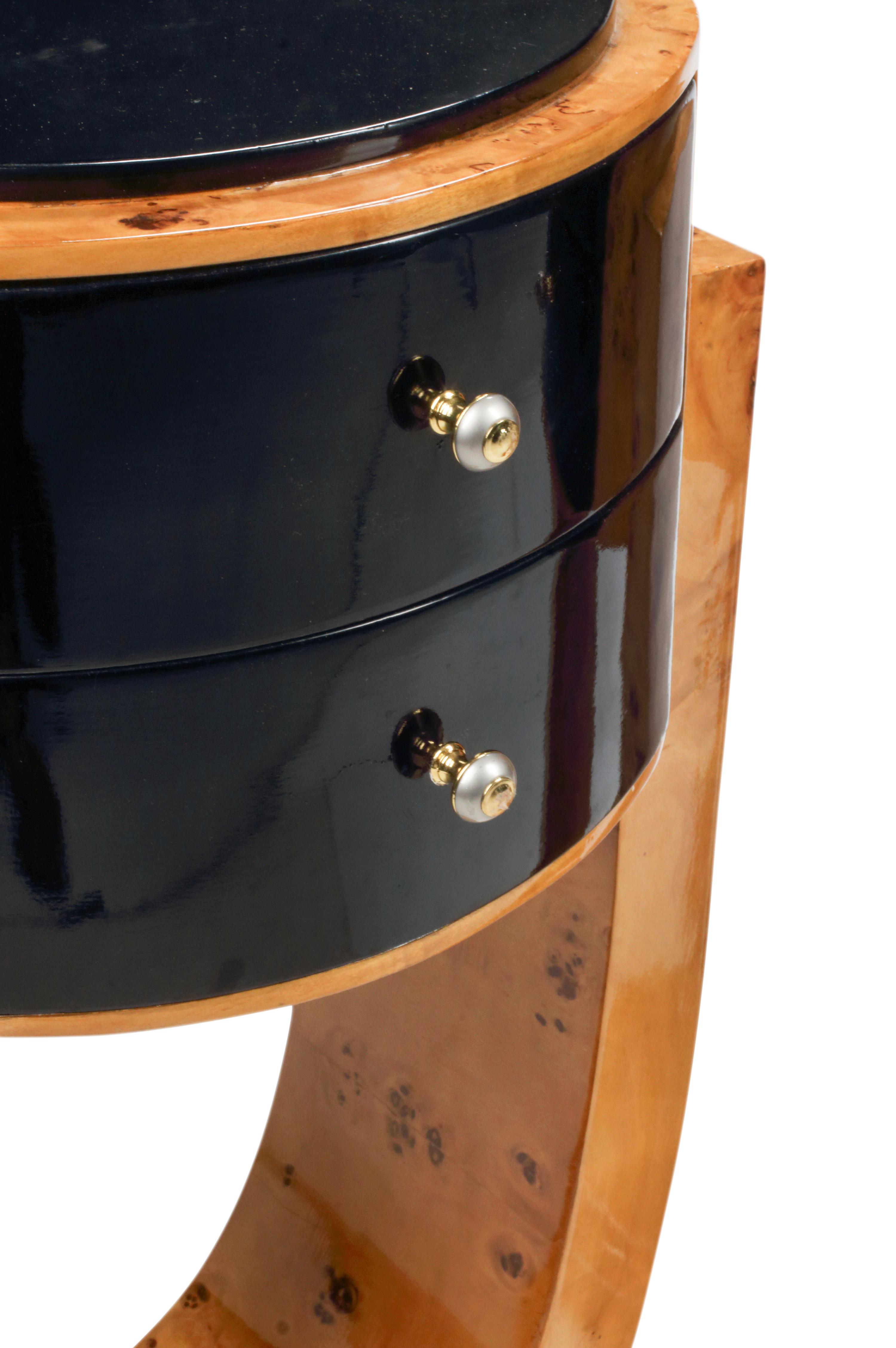 A Pair of Art Deco Style Part-Ebonized Burl Walnut Bedside Cabinets