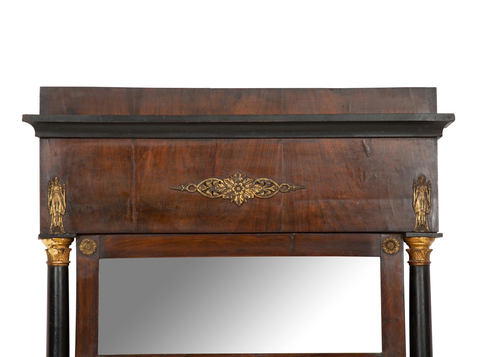 An Empire Gilt Metal Mounted Mahogany Mirro r
