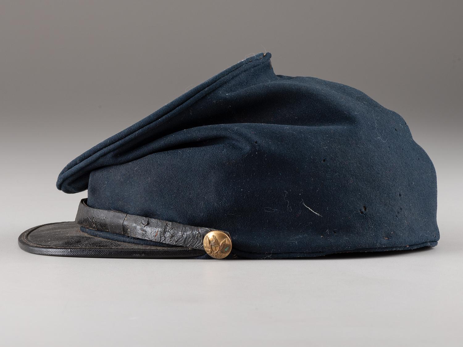 [CIVIL WAR]. 53rd Pennsylvania forage cap with insignia and II Corps, 1st Division badge.