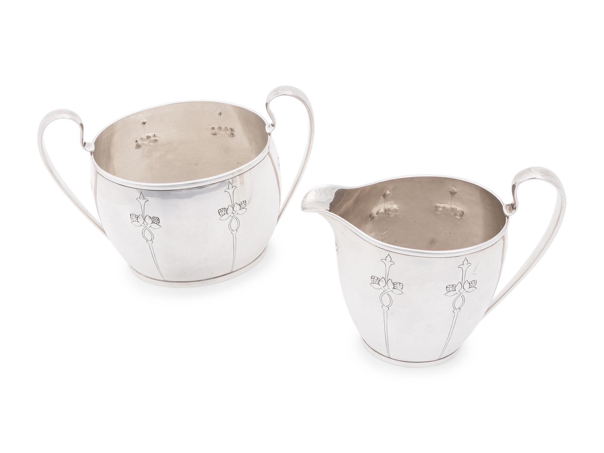An Arthur Stone Arts and Crafts Silver Creamer and Sugar Set