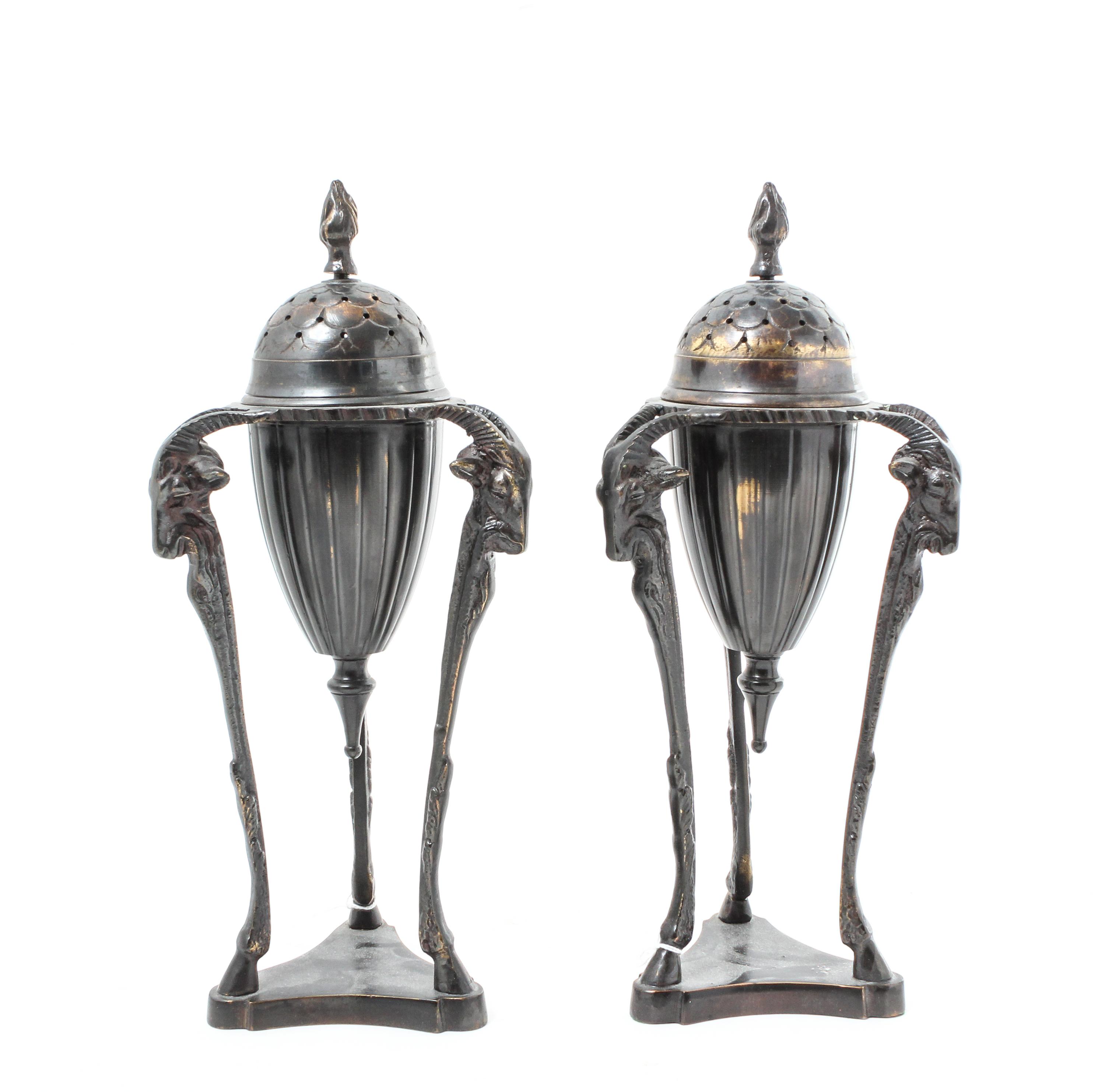 A Pair of Neoclassical Cast Metal Urns on Stand Height overall 11 3/4 inches. — 20TH CENTURY