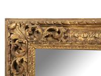 A Continental Carved Giltwood Mirror