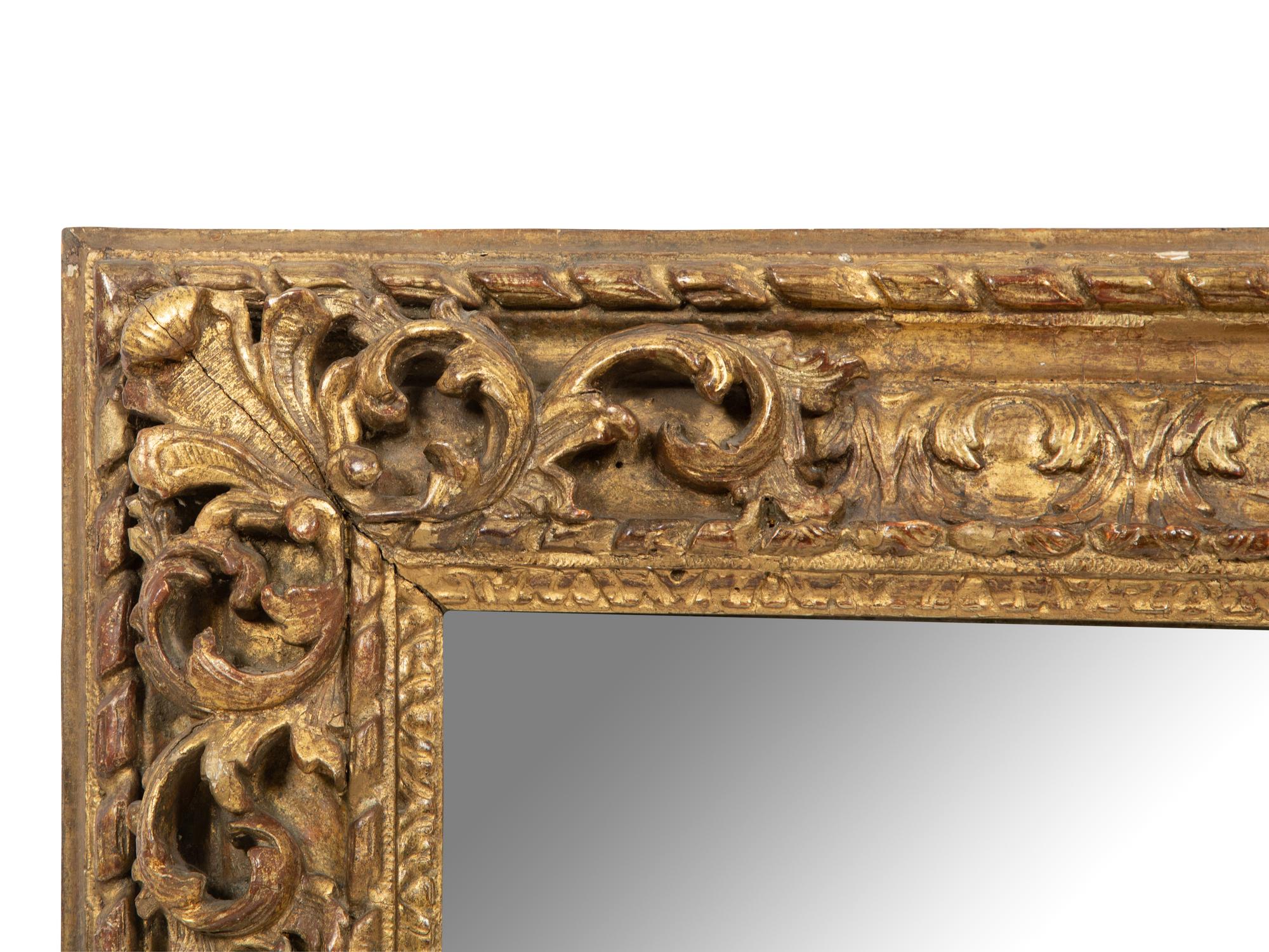 A Continental Carved Giltwood Mirror