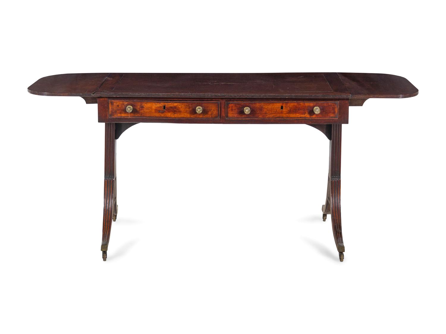 A George III Figured and Brass-Mounted Mahogany Sofa Table